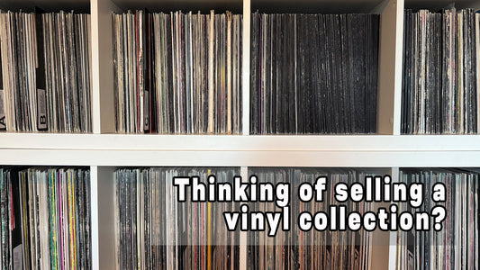 Vinyl record collection stored on shelves, representing a large DJ vinyl archive