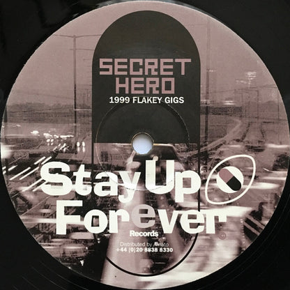 Secret Hero - 1999 Flakey Gigs / Space 1999 & A Half (12")